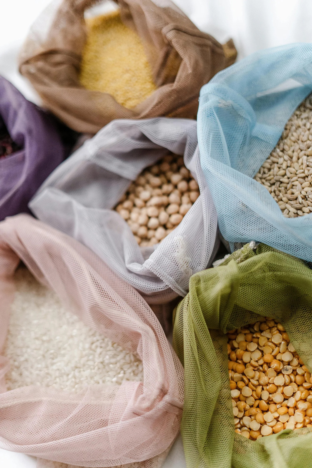 Cloth bags of dried grains, chickpeas and split peas